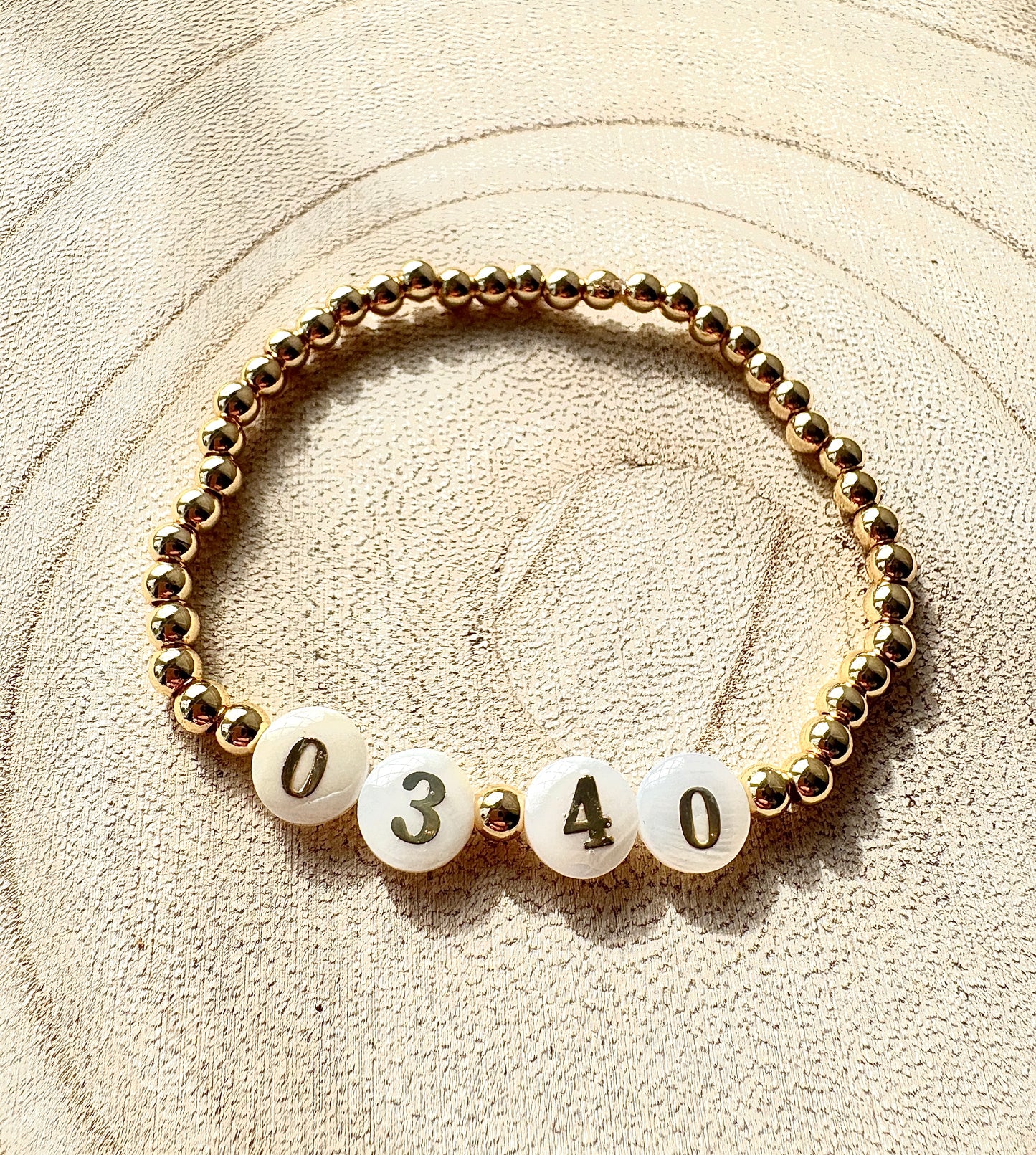 Date & Time Faux Pearl bracelet