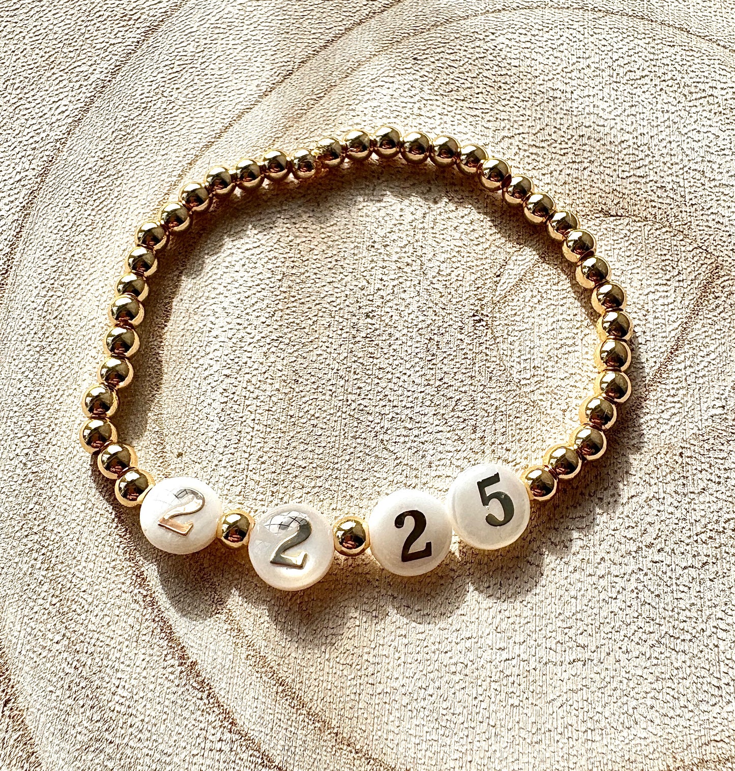 Date & Time Faux Pearl bracelet