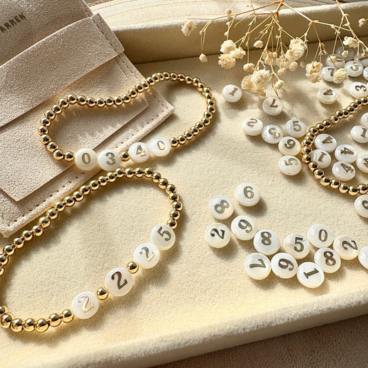 Date & Time Faux Pearl bracelet