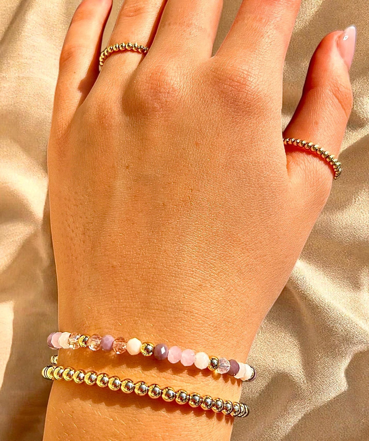 Mixed Purple Bead Bracelet With Gold Accent